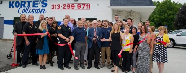 Ribbon cutting for business expansion in TIFA District